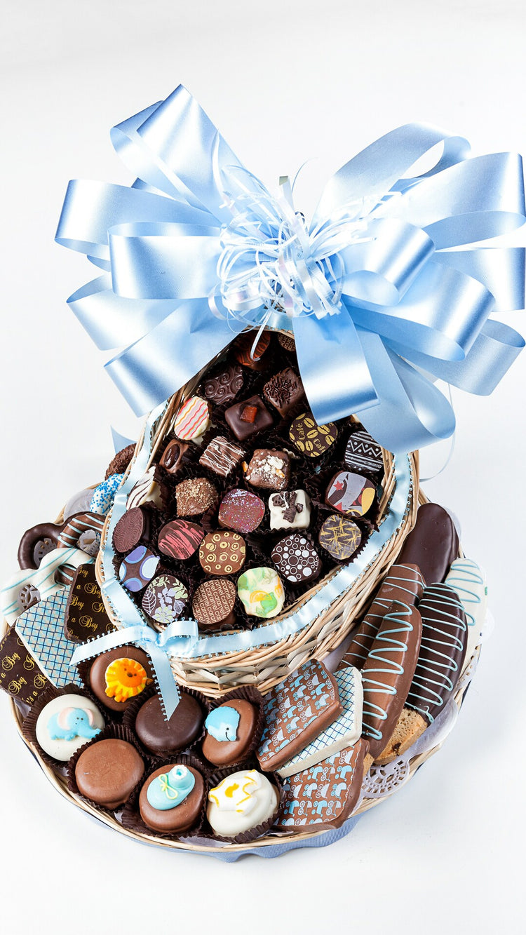 Wicker Bassinette Of Chocolates On Cookie Platter