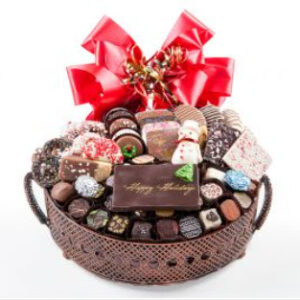 Exotic Bronze vessel with 60 pc of chocos, white chocolate snowman & foil cvrd snowflakes & trees