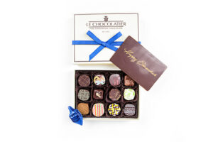 Box of 12 truffles. A chocolate plaque with Happy Chanukah & a foil wrapped chocolate dreidel