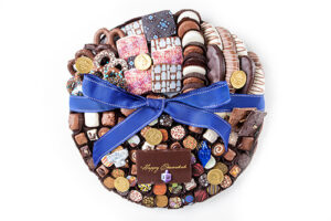 102pc Chocos, cookies, pretzels, & nut bark in Chanukah colors & deco. With choco plq Happy Chanukah