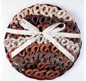 Platter has 56 choco cvrd pretzels, with sprinkles & choco drizzle. Pretzels are kosher with OU cert