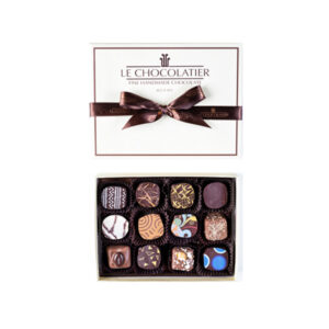12 PC BOX OF TRUFFLES in 8 delicious flavors, from: Dark to White, Crème, Raspberry, Carmel & PButtr