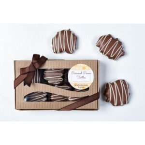 6 Luscious Caramel Pecan Turtles drenched in special milk chocolate. Drizzled with white chocolate.